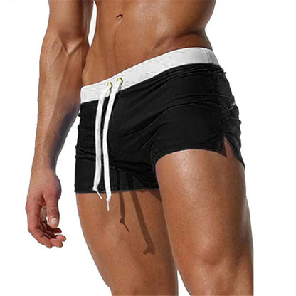 Fitted short leg board shorts for men with side split hems and zip pocket