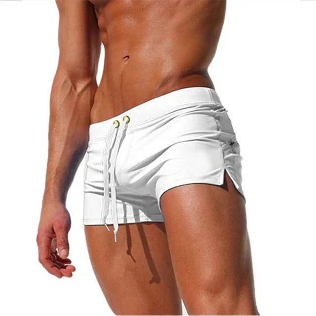 Fitted short leg board shorts for men with side split hems and zip pocket