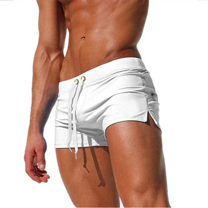 Fitted short leg board shorts for men with side split hems and zip pocket