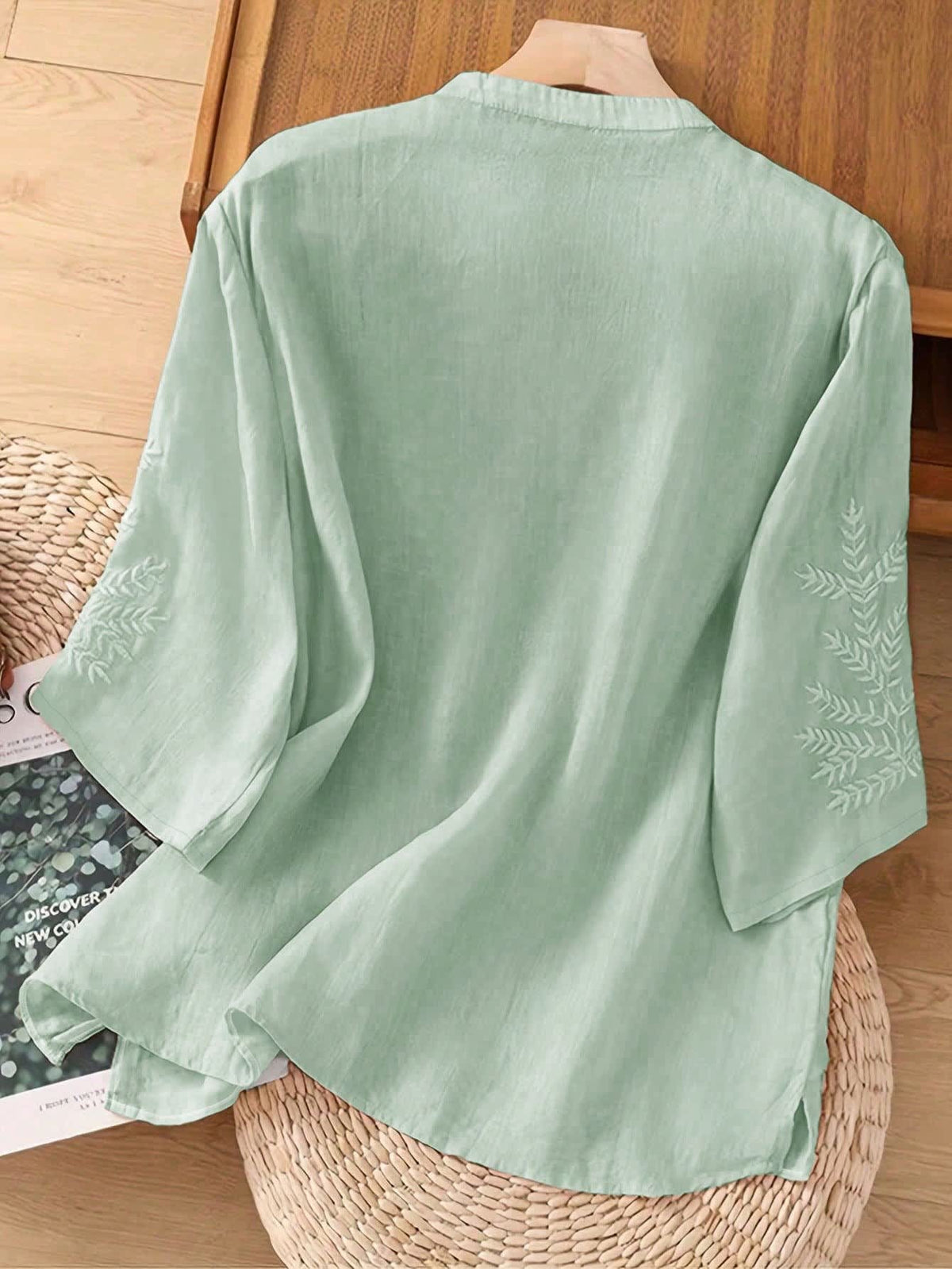 Blouse with embroidered V-neck and half sleeves for women