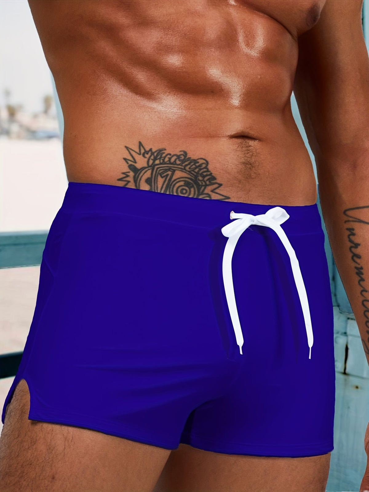 Short length fitted board shorts for men with drawstring waist and side split hem
