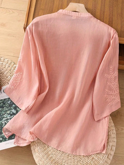 Blouse with embroidered V-neck and half sleeves for women