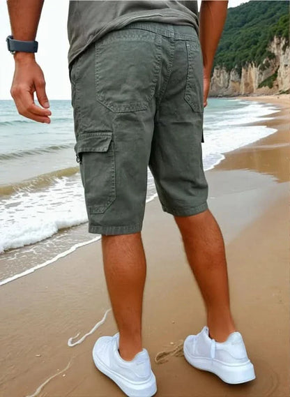 Mens shorts with knee-length cut, zip fly, belt loops and button cargo pockets
