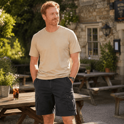 Mens shorts with knee-length cut, zip fly, belt loops and button cargo pockets