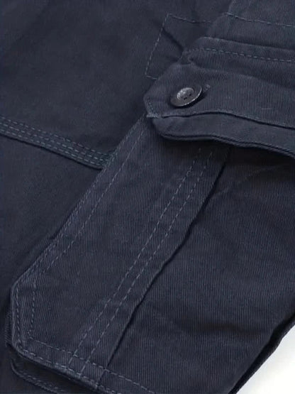 Mens shorts with knee-length cut, zip fly, belt loops and button cargo pockets