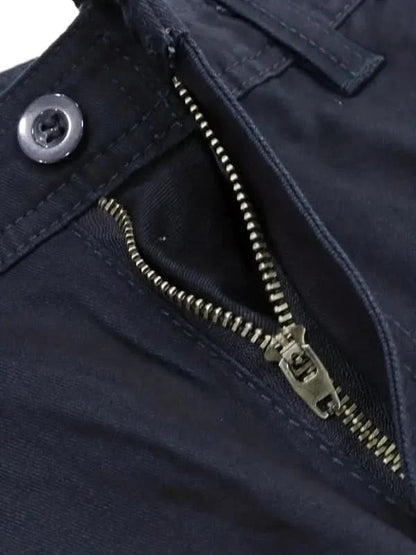 Mens shorts with knee-length cut, zip fly, belt loops and button cargo pockets