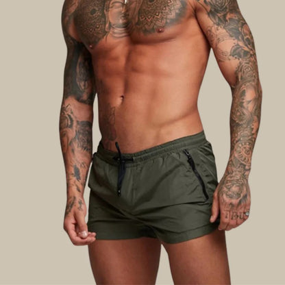 Short length board shorts for men with drawstring waist and zip side pockets