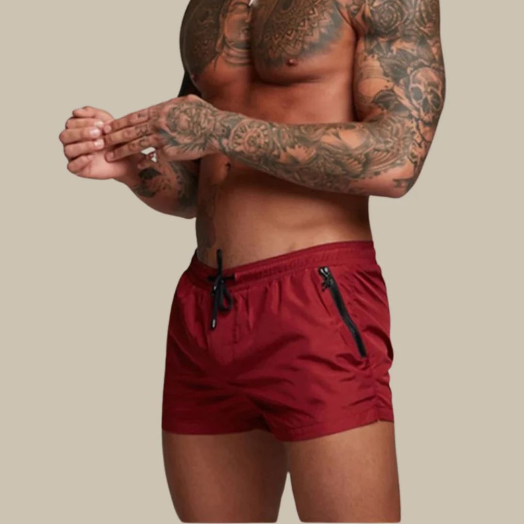 Short length board shorts for men with drawstring waist and zip side pockets