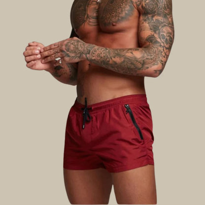 Short length board shorts for men with drawstring waist and zip side pockets
