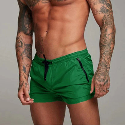 Short length board shorts for men with drawstring waist and zip side pockets