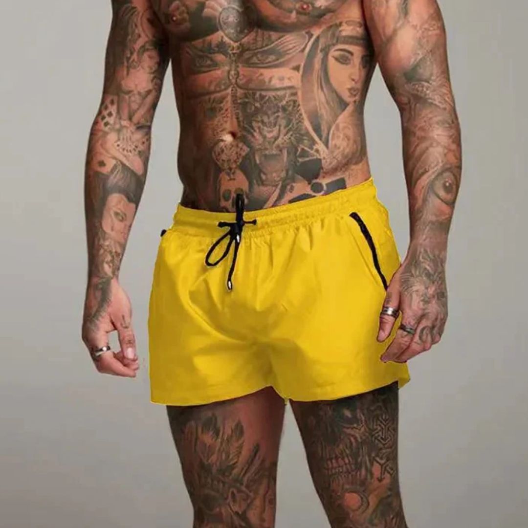 Short length board shorts for men with drawstring waist and zip side pockets