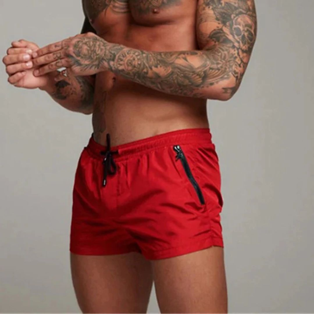 Short length board shorts for men with drawstring waist and zip side pockets