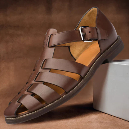 Men sandals fisherman design with closed toe, woven front straps and low stacked heel