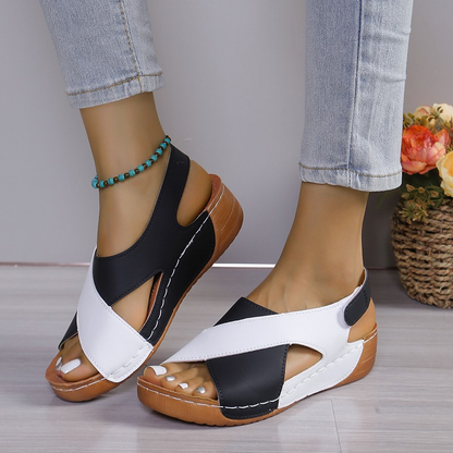 Women sandals with wedge heel, crossover straps and ankle strap