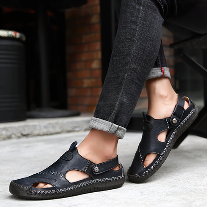Men sandals with closed toe and back strap fastening