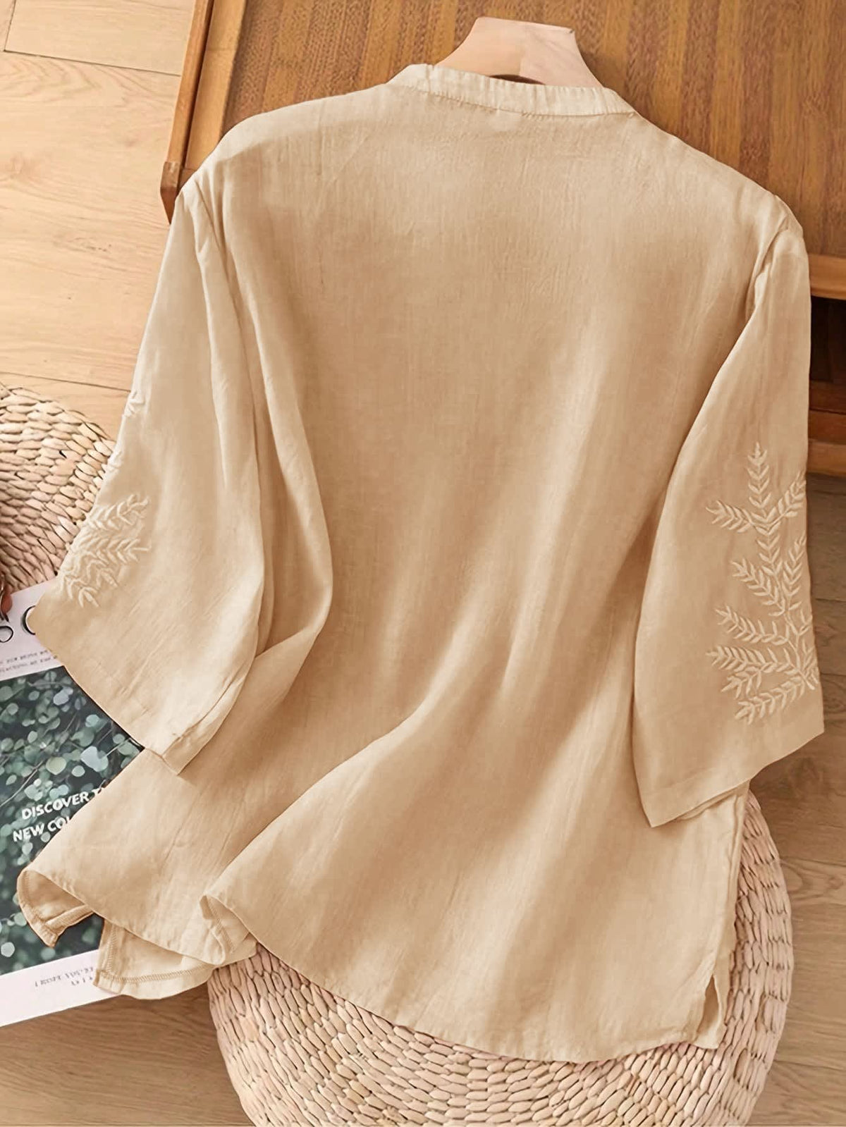 Blouse with embroidered V-neck and half sleeves for women