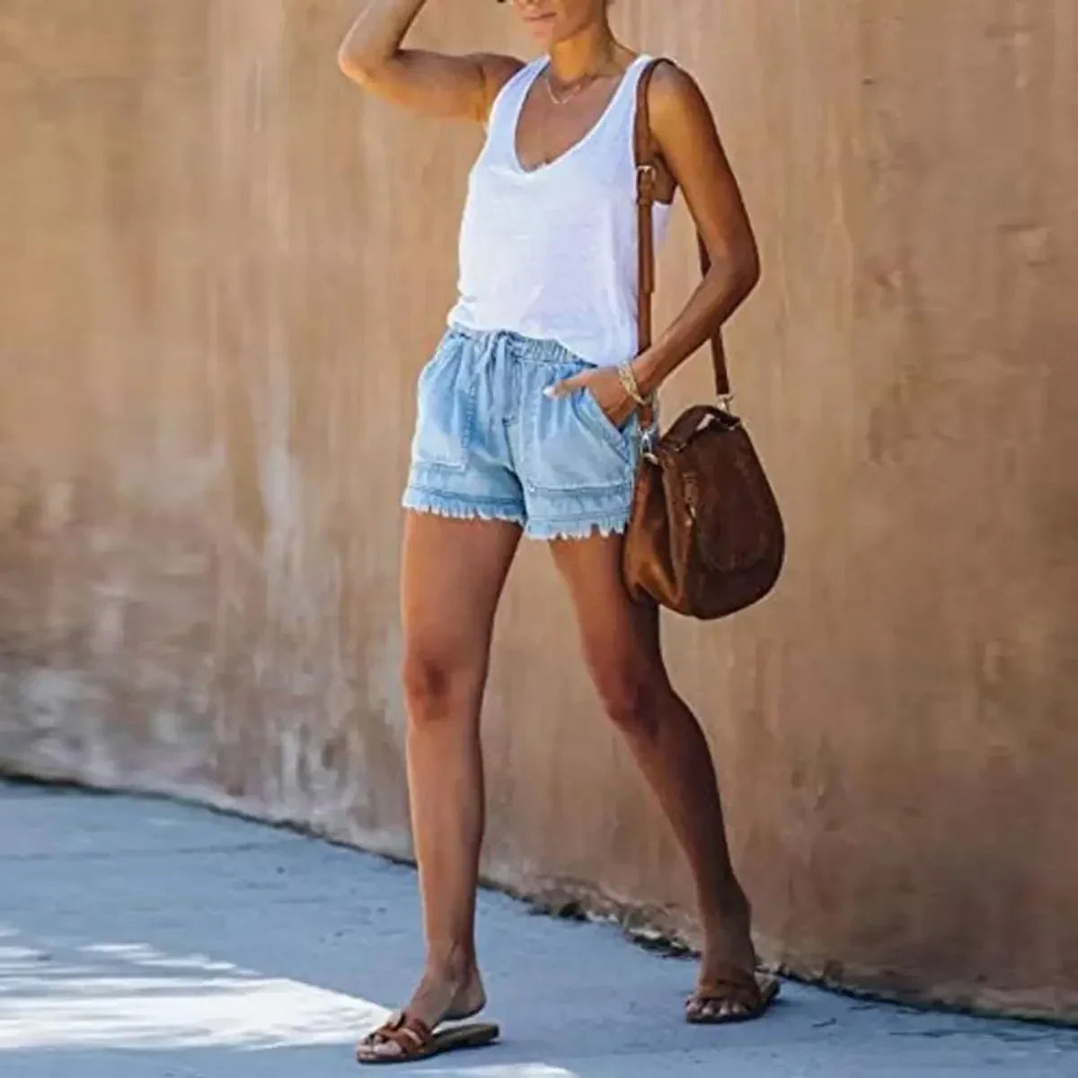 Womens shorts with drawstring waist and frayed hem, denim look