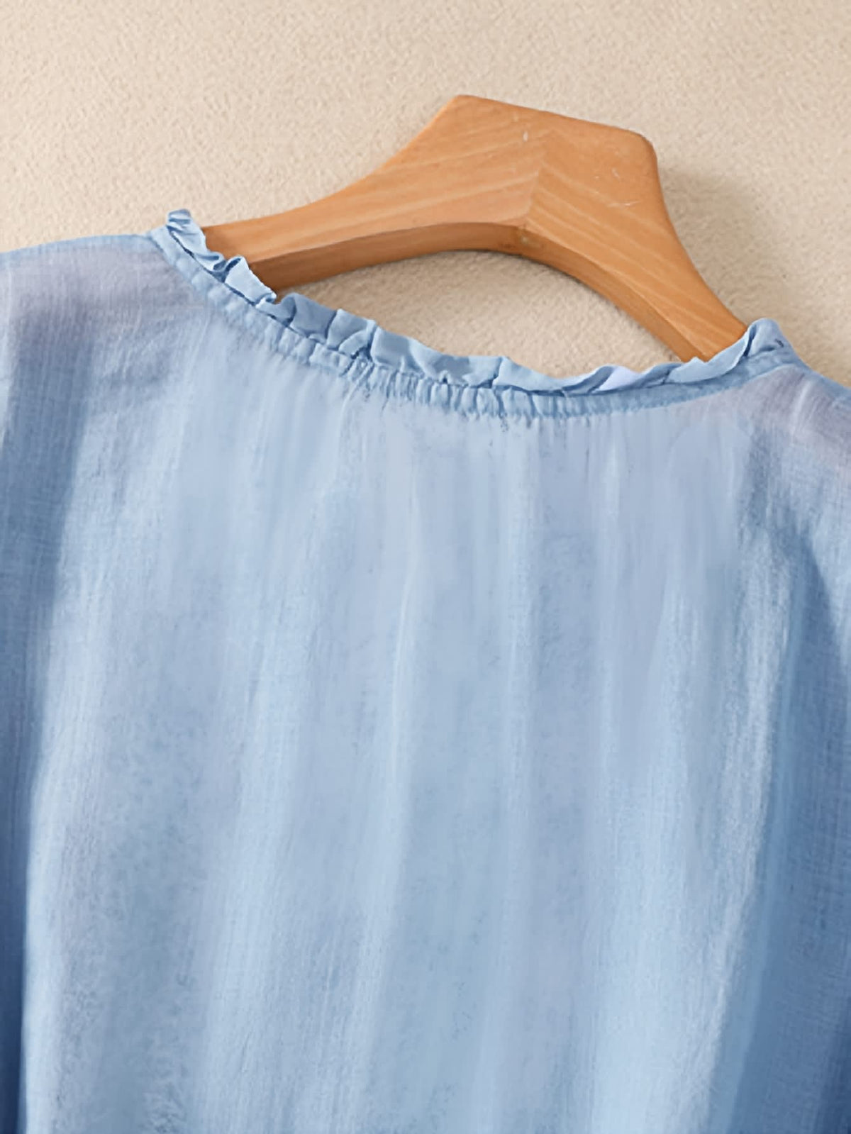 Embroidered blouse for women with ruffle neckline and half sleeves