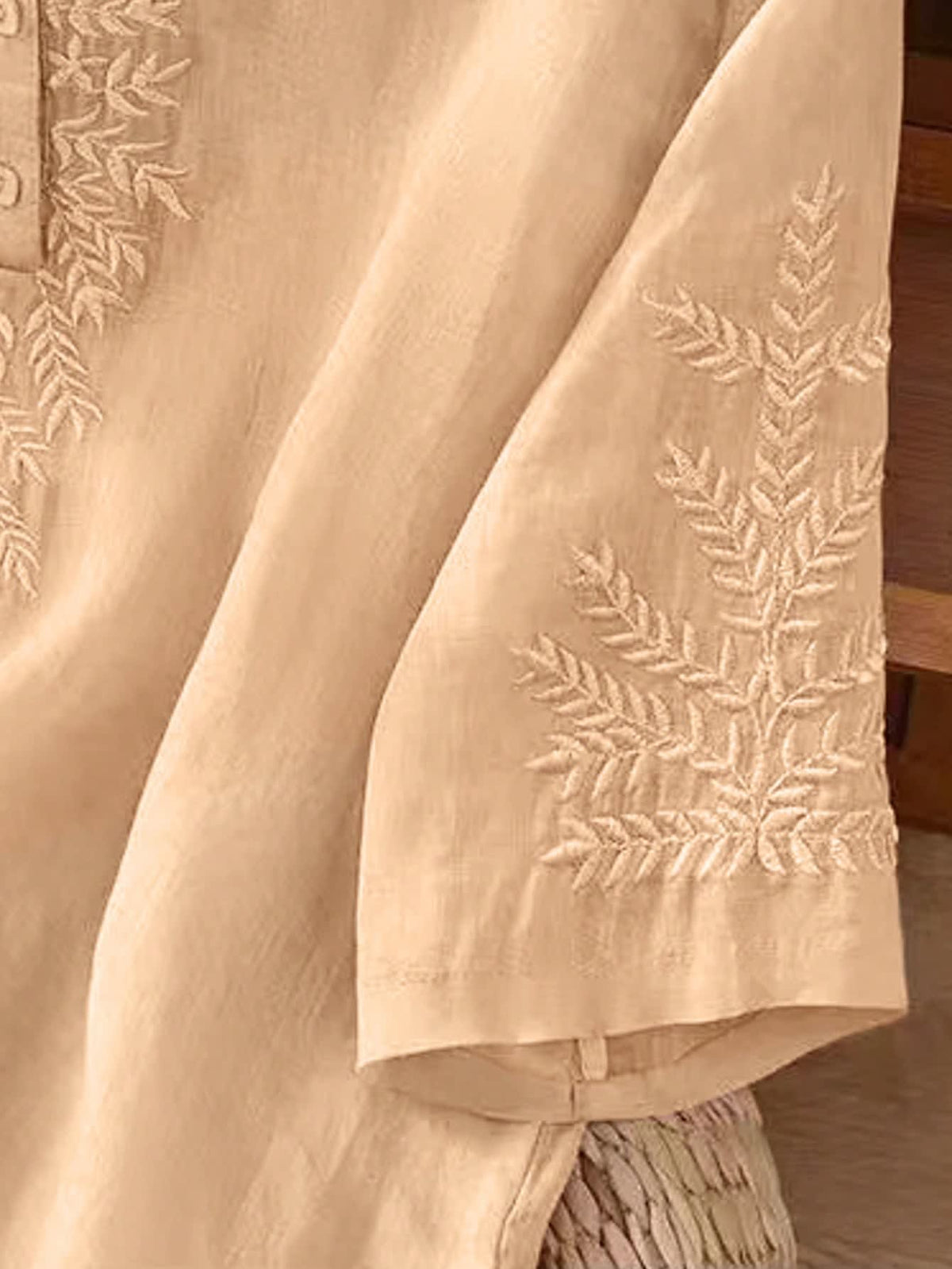 Blouse with embroidered V-neck and half sleeves for women