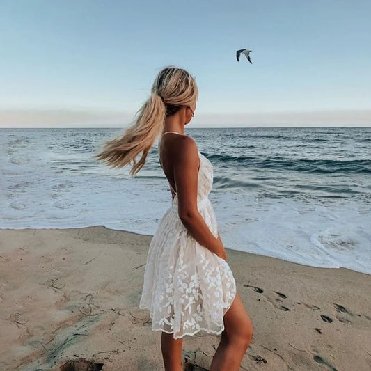 Mini dress for women with deep v-neck and adjustable straps
